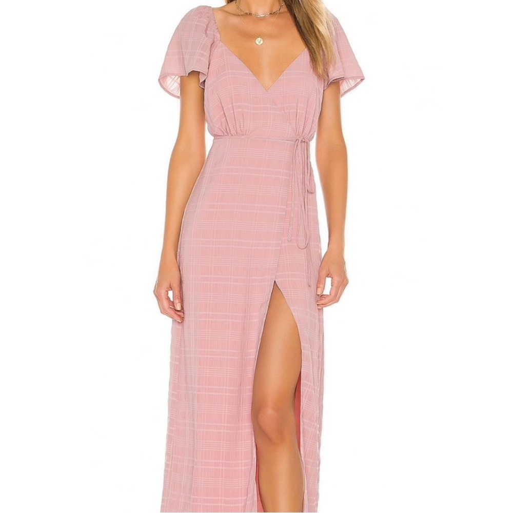 Cute pink wrap dress with flutter sleeves. Size small
